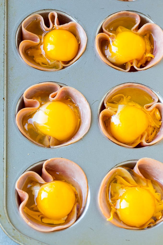 Ham and Egg Cups Recipe | Low Carb Breakfast | Ham and Eggs #ham #eggs #lowcarb #breakfast #edsug Ham pressed into muffin tins and topped with eggs and cheese.