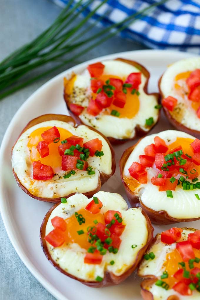 Ham and Egg Cups Recipe | Low Carb Breakfast | Ham and Eggs #ham #eggs #lowcarb #breakfast #edsug A plate of ham cups filled with eggs and cheese.