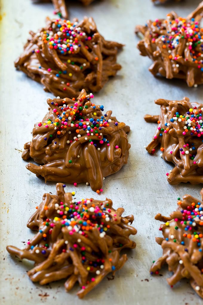 Haystack Cookies Recipe | No Bake Cookies | Chow Mein Noodle Cookies #nobakecookies #cookies #recipe #chocolate #edsug Haystack cookies made with chow mein noodles on a baking sheet.