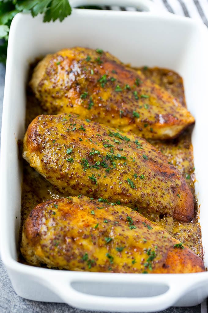 Honey Mustard Chicken Recipe | Baked Chicken Recipe | Easy Chicken Recipe #chicken #dinner #edsug Baked honey mustard chicken garnished with chopped parsley.