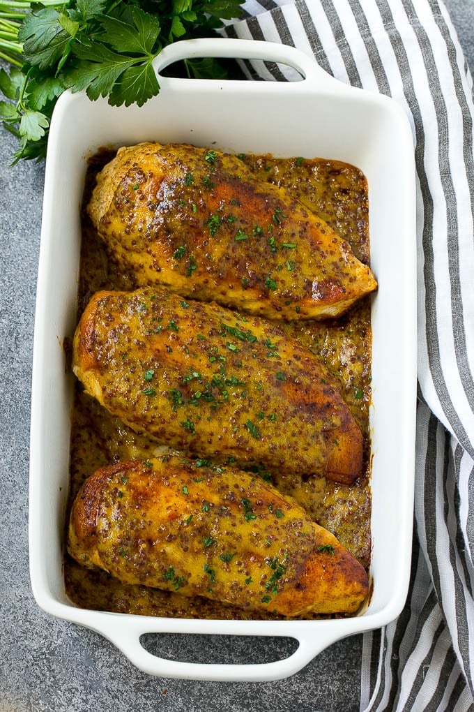 Honey Mustard Chicken Recipe | Baked Chicken Recipe | Easy Chicken Recipe #chicken #dinner #edsug A baking dish of honey mustard chicken breasts.