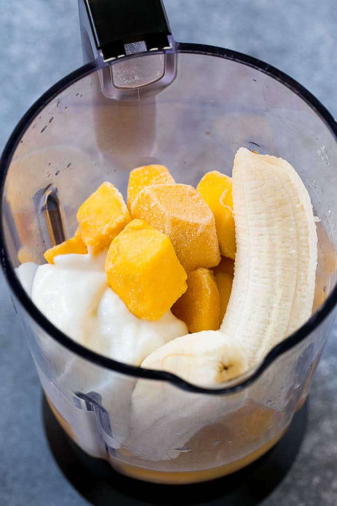 Mango Smoothie Recipe | Mango Recipe | Healthy Smoothie #mango #smoothie #drink #edsug Fruit, yogurt and juice in a blender.