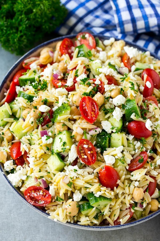 Orzo Salad Recipe | Orzo Pasta Salad | Greek Orzo Salad | Mediterranean Orzo Salad #pastasalad #orzo #greekfood #salad #edsug Greek orzo salad with pasta, cucumbers, tomatoes and feta cheese.