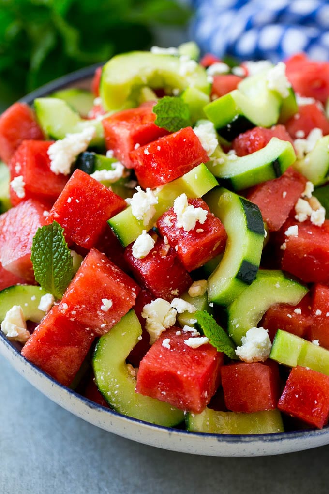 Watermelon Salad Recipe | Watermelon Feta Salad | Watermelon Cucumber Salad #watermelon #cucumber #salad #edsug Watermelon salad with cucumbers, feta cheese and mint in a serving bowl.