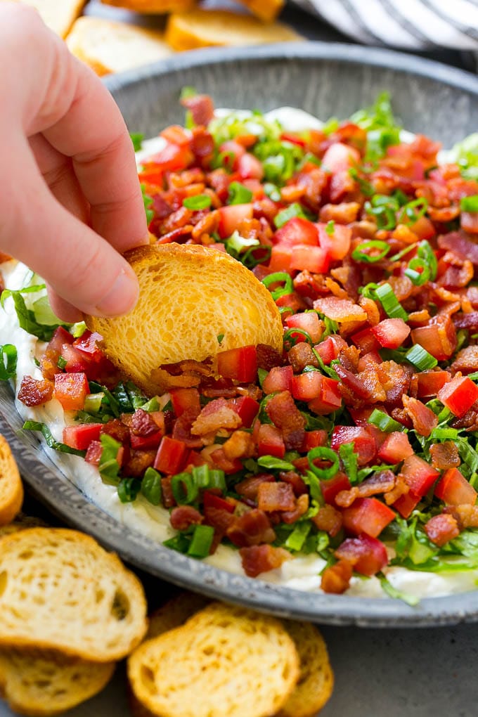 BLT Dip Recipe | Bacon Dip Recipe | Ranch Dip #dip #ranch #bacon #lettuce #tomato #appetizer #edsug BLT dip with bacon, lettuce, tomato and green onions over a creamy ranch dip.