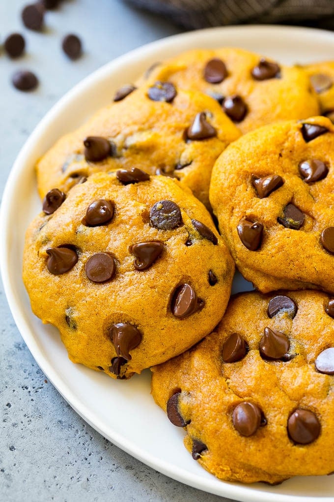 Pumpkin Chocolate Chip Cookies Recipe | Pumpkin Cookies | Pumpkin Chocolate Cookies #pumpkin #cookies #chocolate #baking #fall #edsug #dessert A plate of pumpkin chocolate chip cookies.