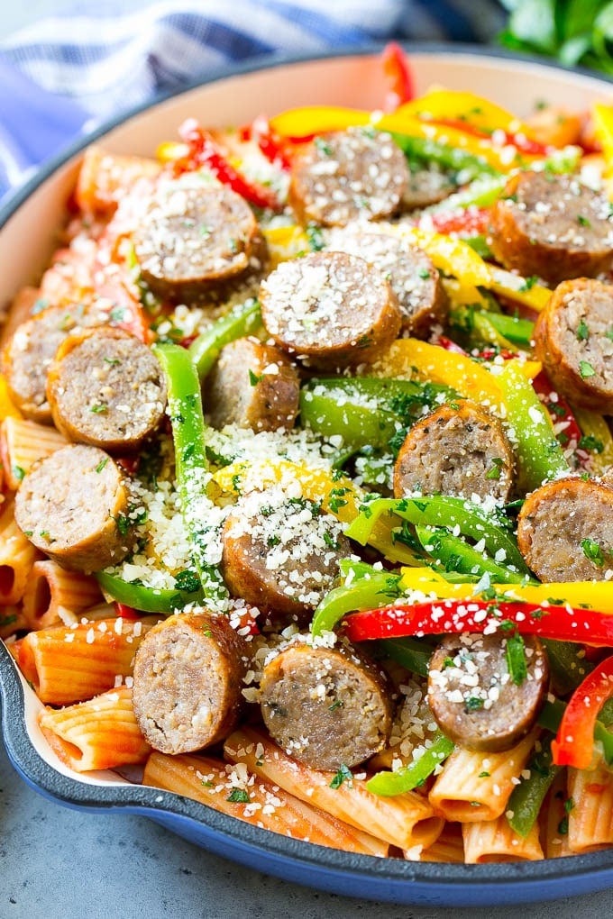 Sausage and Pepper Pasta Recipe | Italian Sausage Recipe | Sausage and Peppers | Easy Pasta #pasta #sausage #peppers #dinner #edsug Sausage and pepper pasta with sliced Italian sausage, red and yellow bell peppers and grated parmesan cheese.