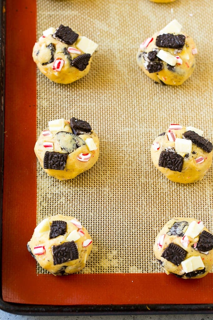 Oreo Peppermint Cookies Recipe | Candy Cane Cookies | Oreo Cookies #oreo #peppermint #cookies #baking #Christmas #sweets #edsug A sheet pan of unbaked cookies.