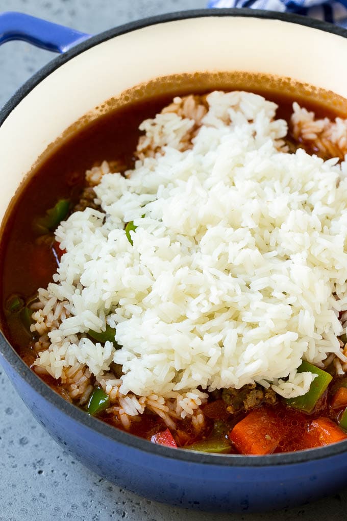 Stuffed Pepper Soup Recipe | Beef and Rice Soup | Stuffed Peppers #peppers #soup #beef #rice #dinner #edsug Cooked rice being on top of soup.
