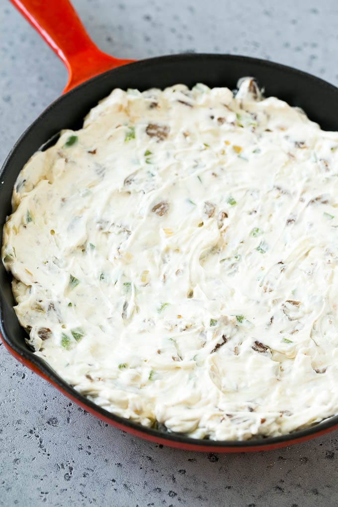 Philly Cheesesteak Dip Recipe | Cheesy Dip | Baked Cheese Dip #steak #dip #appetizer #cheese #edsug Steak, peppers and onions in a skillet, mixed with cream cheese.