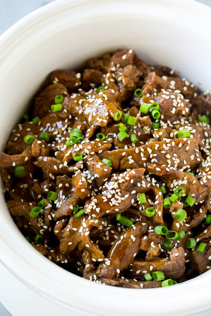 Slow Cooker Korean Beef Recipe | Korean Beef | Flank Steak Recipe #dinner #beef #slowcooker #crockpot #asian #edsug Slow cooker Korean beef with flank steak slices in a sweet and savory sauce, all inside a crock pot.
