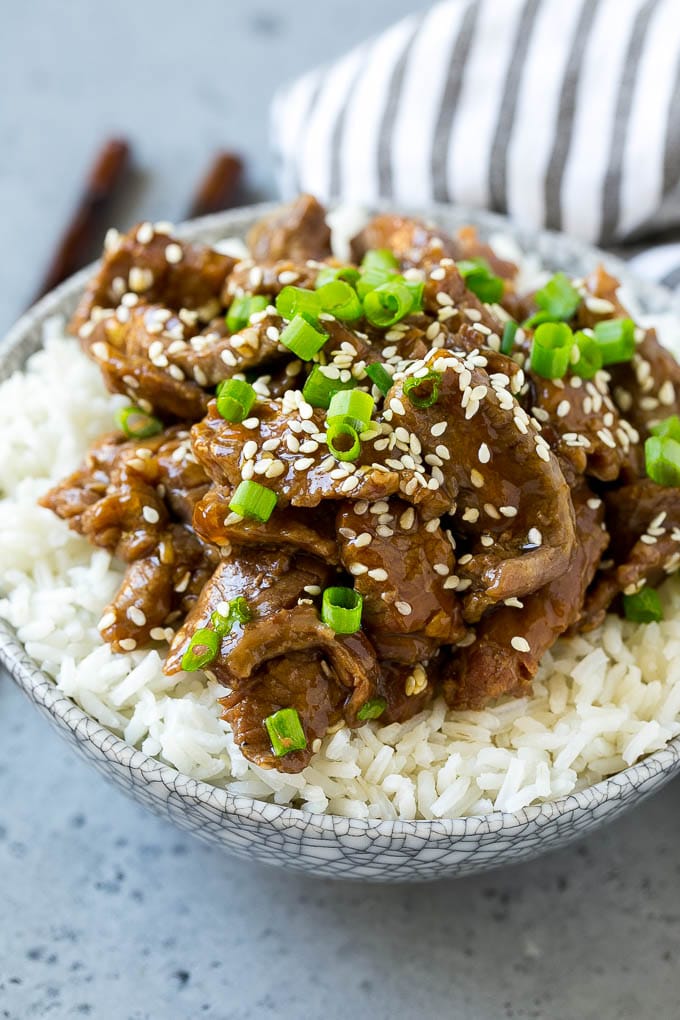 Slow Cooker Korean Beef Recipe | Korean Beef | Flank Steak Recipe #dinner #beef #slowcooker #crockpot #asian #edsug Slow cooker Korean beef served over steamed rice.