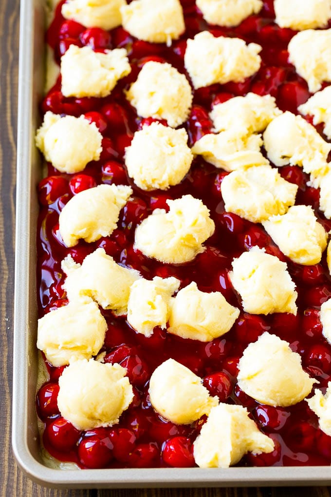 Cherry Bars Recipe | Cherry Pie Bars | Cherry Cookies | Bar Cookies #cookies #bars #cherry #baking #dessert #sweets #edsug Filling with dollops of cookie dough on top.