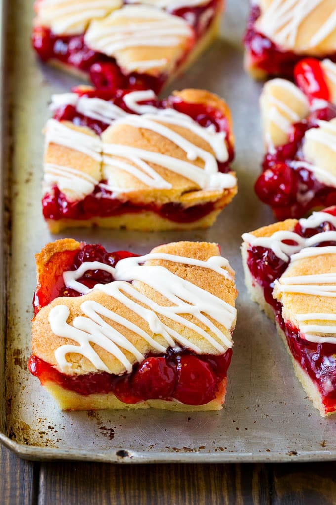 Cherry Bars Recipe | Cherry Pie Bars | Cherry Cookies | Bar Cookies #cookies #bars #cherry #baking #dessert #sweets #edsug Cherry bars made with almond cookie dough on a sheet pan.