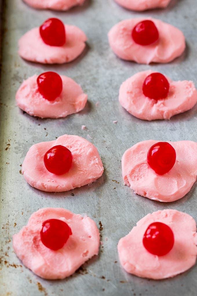 Chocolate Covered Cherries Recipe | Cherry Cordials | Cherry Candy #chocolate #candy #dessert #cherry #sweets #edsug Discs of cherry filling with a maraschino cherry on top.