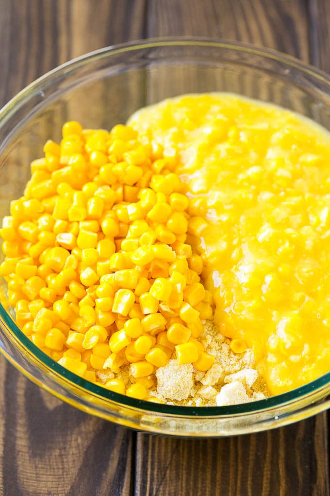 Corn Pudding Recipe | Corn Casserole | Corn Side Dish #corn #pudding #casserole #sidedish #thanksgiving #dinner #edsug Corn kernels, creamed corn and cornbread mix in a bowl.