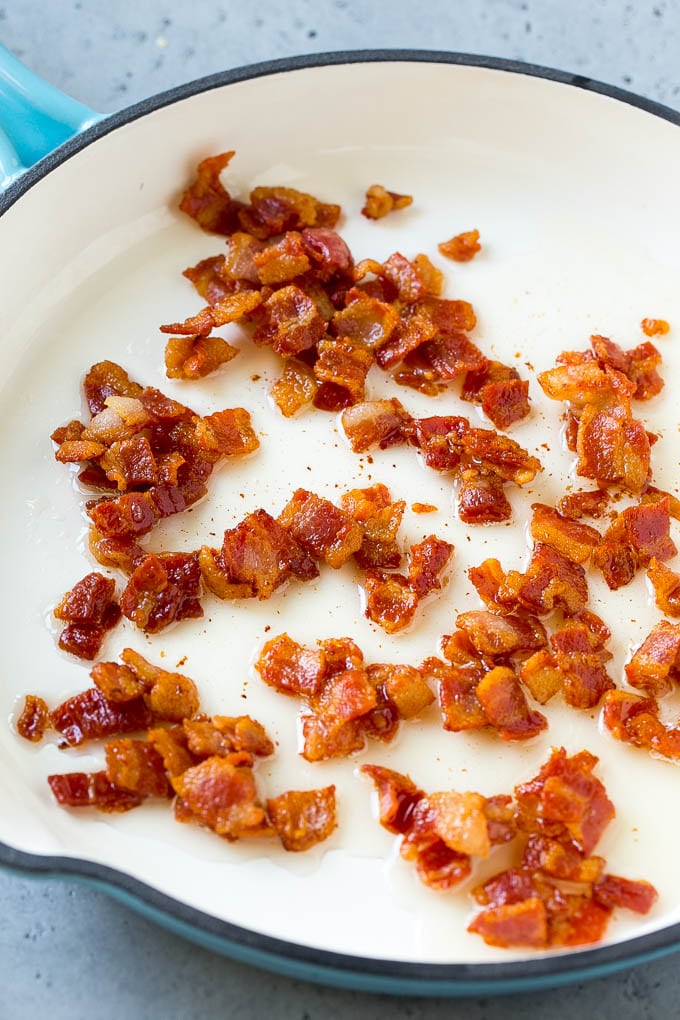 Fried Cabbage Recipe | Cabbage with Bacon | Cabbage Side Dish #cabbage #bacon #sidedish #lowcarb #keto #edsug Cooked bacon in a skillet.