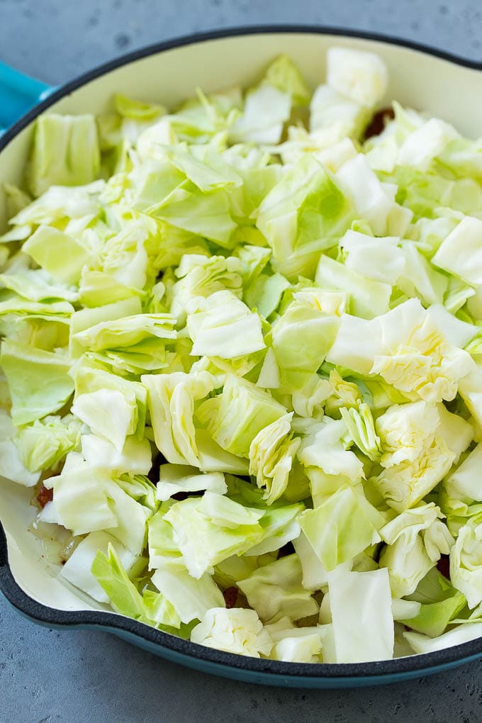 Fried Cabbage Recipe | Cabbage with Bacon | Cabbage Side Dish #cabbage #bacon #sidedish #lowcarb #keto #edsug Bacon, onions and cabbage in a skillet.