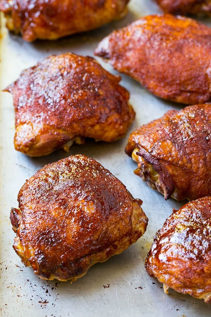 Smoked Chicken Thighs Recipe | Barbecue Chicken Thighs | Easy Chicken Thighs #chicken #barbecue #smoker #dinner #edsug Cooked poultry on a sheet pan.