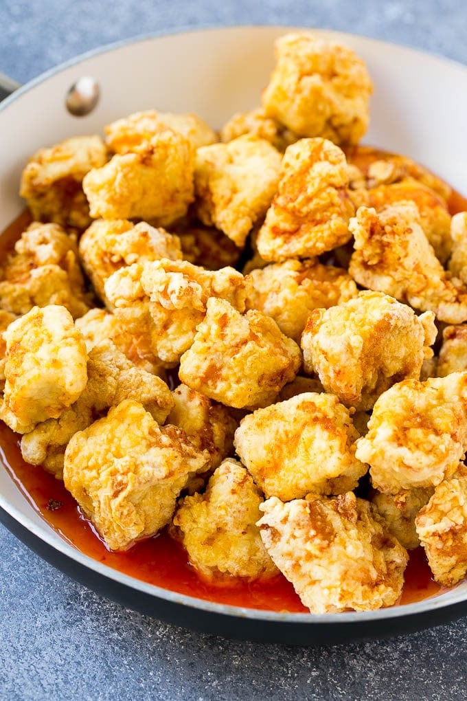 Sweet Chili Chicken Recipe | Thai Chicken | Asian Chicken #chicken #thaifood #chili #dinner #edsug Crispy chicken breast pieces with sweet chili sauce in a pan.