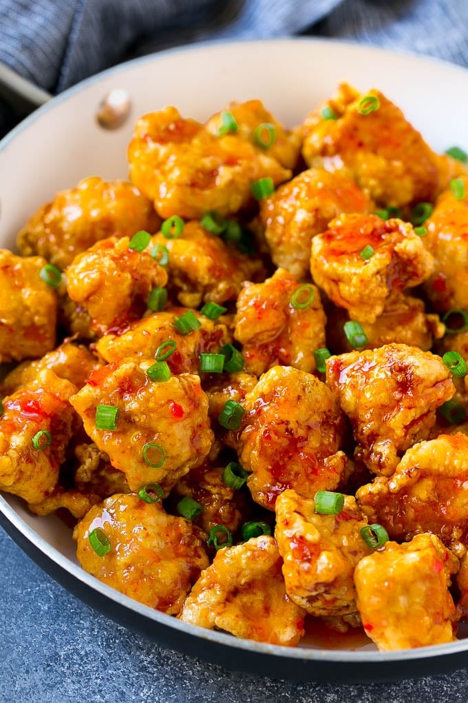 Sweet Chili Chicken Recipe | Thai Chicken | Asian Chicken #chicken #thaifood #chili #dinner #edsug Sweet chili chicken in a skillet, topped with sliced green onions.