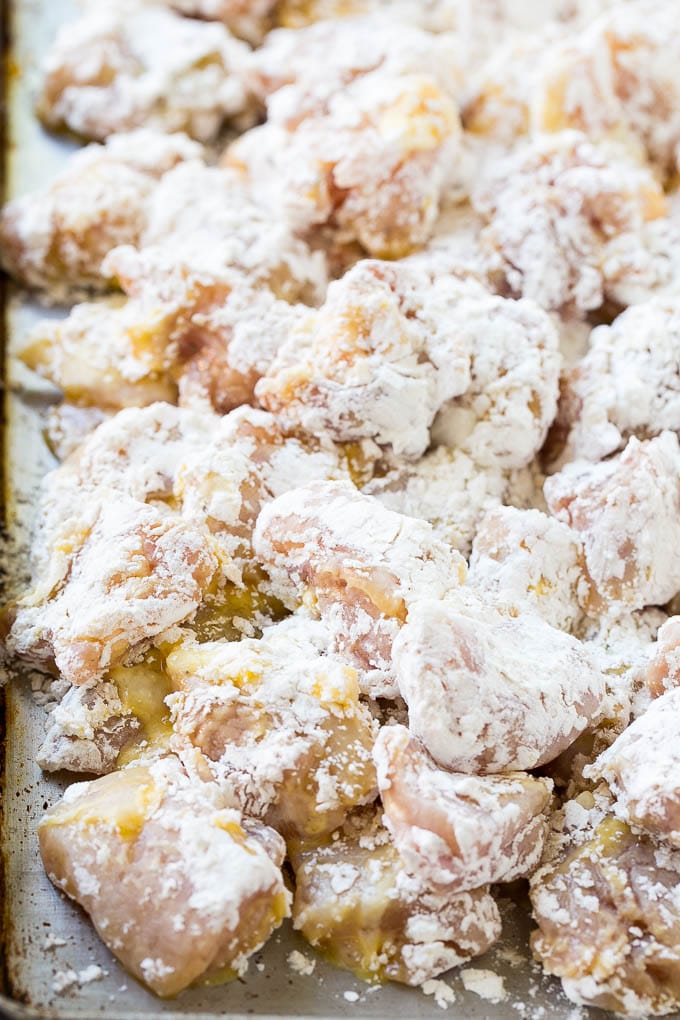 Sweet Chili Chicken Recipe | Thai Chicken | Asian Chicken #chicken #thaifood #chili #dinner #edsug Chicken pieces coated in egg and flour.