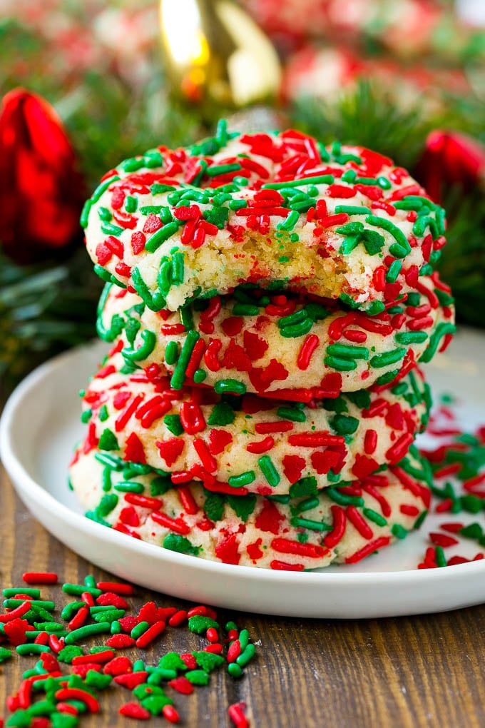 Cake Mix Cookies Recipe | Sprinkle Cookies | Christmas Cookies #cookies #christmas #sprinkles #dessert #baking #edsug A stack of cake mix cookies made with white cake mix and festive sprinkles.