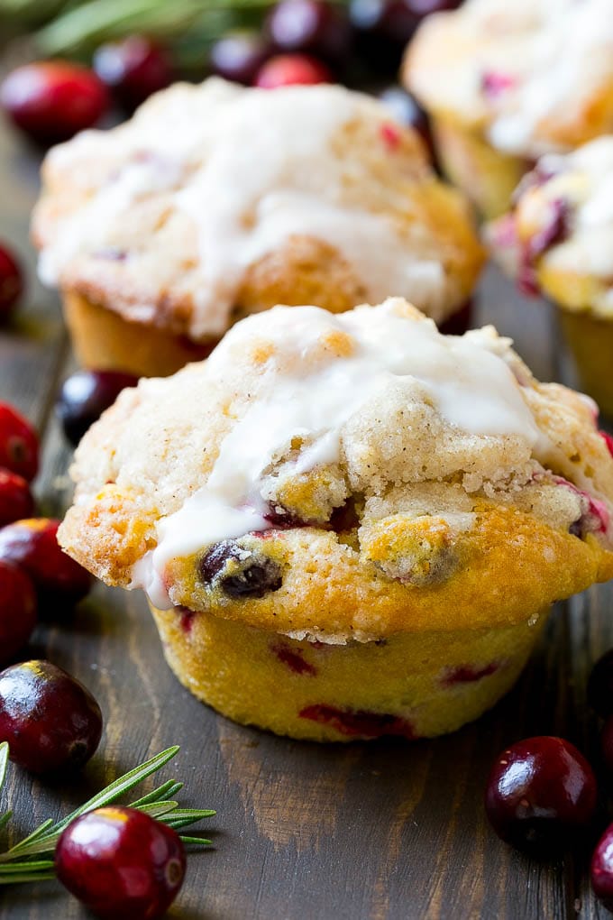 Cranberry Muffins Recipe | Cranberry Orange Muffins #cranberry #muffins #orange #fall #dessert #edsug Cranberry muffins topped with streusel and orange glaze.