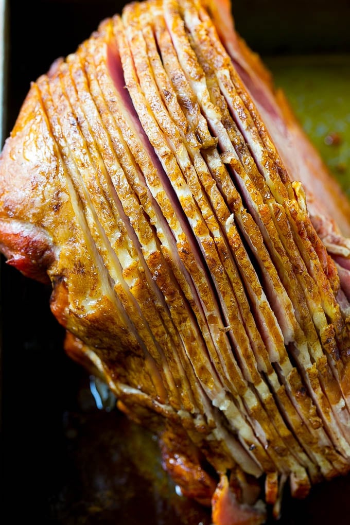 Honey Baked Ham Recipe | Glazed Ham | Holiday Ham #ham #dinner #edsug #christmas #thanksgiving #easter A spiral cut ham that's been baked and is ready for glaze.