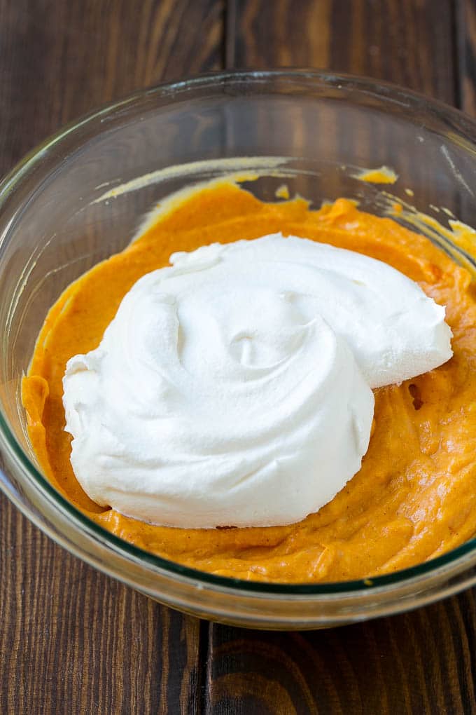 Pumpkin Dip Recipe | Dessert Dip | Pumpkin Pie Dip #pumpkin #dessert #dip #fall #thanksgiving #edsug Cool whip in a bowl with the creamy base.