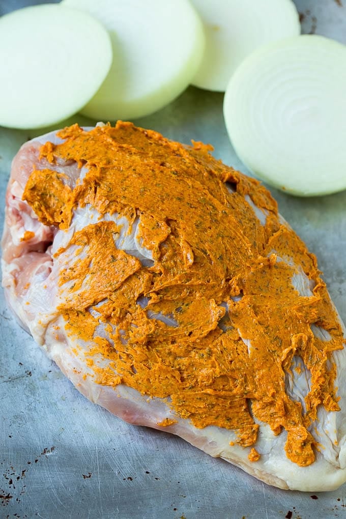 This slow cooker turkey breast is coated in a seasoned herb butter, then placed in the crock pot to cook to tender perfection. It's the perfect way to free up oven space for your big holiday meal. Poultry coated in seasoned butter.