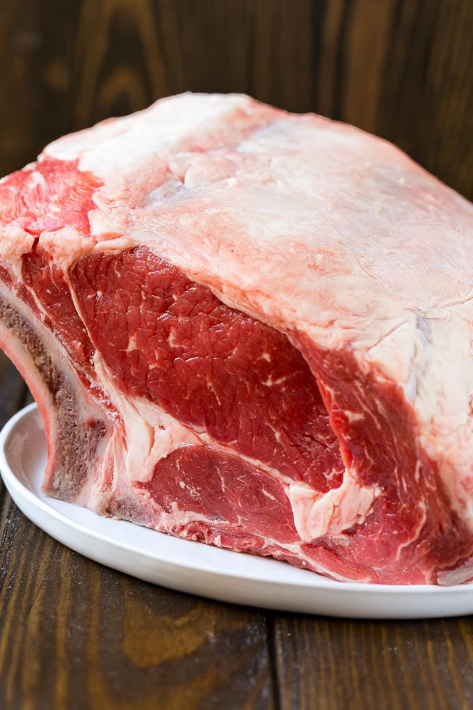 Smoked Prime Rib Recipe | Easy Prime Rib | Smoked Beef | Holiday Prime Rib #primerib #beef #smoker #dinner #edsug #christmas #thanksgiving #lowcarb #keto An uncooked standing rib roast.
