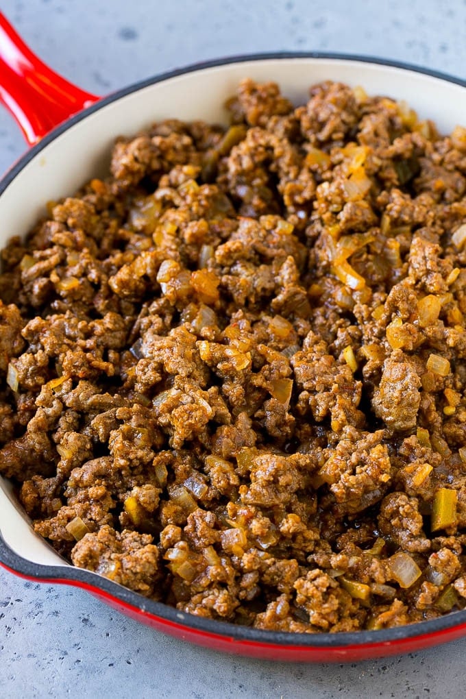 Dorito Casserole Recipe | Mexican Casserole | Beef Casserole #mexicanfood #beef #groundbeef #casserole #dinner #edsug Ground beef, onions and salsa in a skillet.