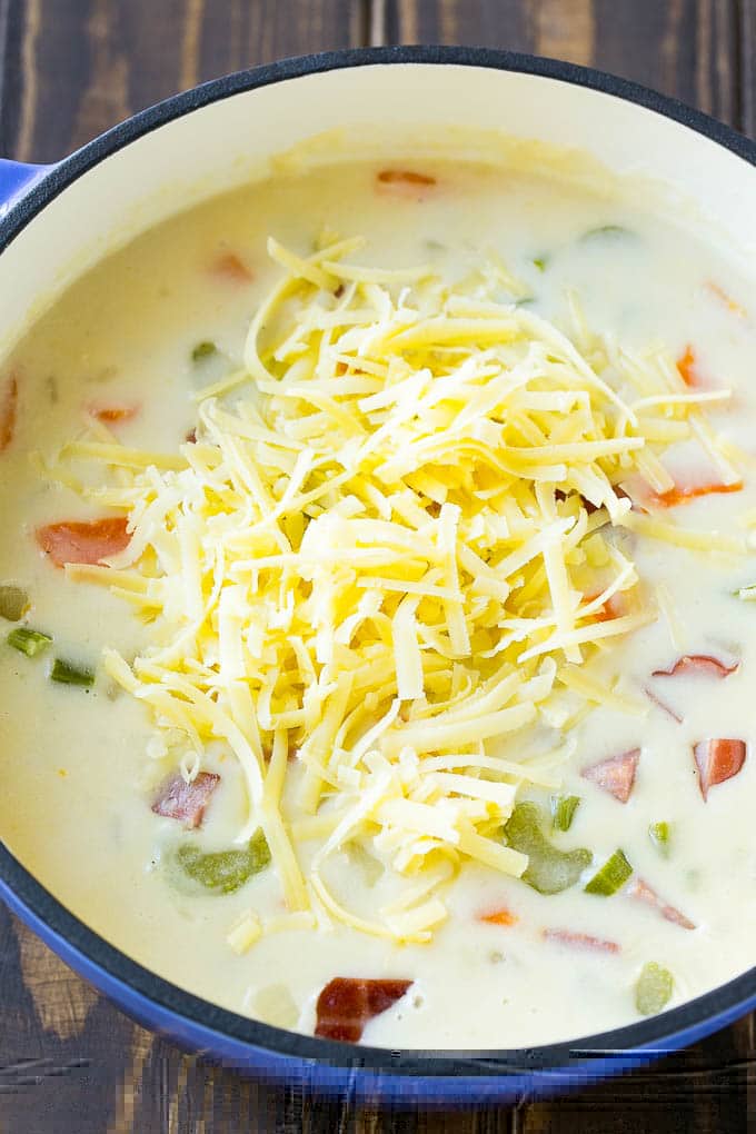 Ham and Potato Soup | Ham Soup | Potato Soup #soup #ham #potato #dinner #comfortfood #edsug Shredded white cheddar cheese to be stirred into ham and potato soup.