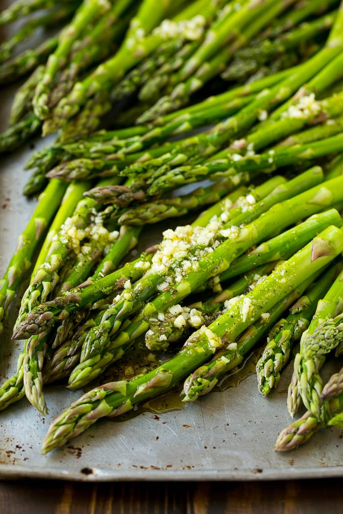 Roasted Asparagus Recipe | Baked Asparagus | Asparagus Side Dish #asparagus #garlic #sidedish #keto #lowcarb #dinner #edsug Raw spears drizzled with olive oil, garlic, herbs, salt and pepper.