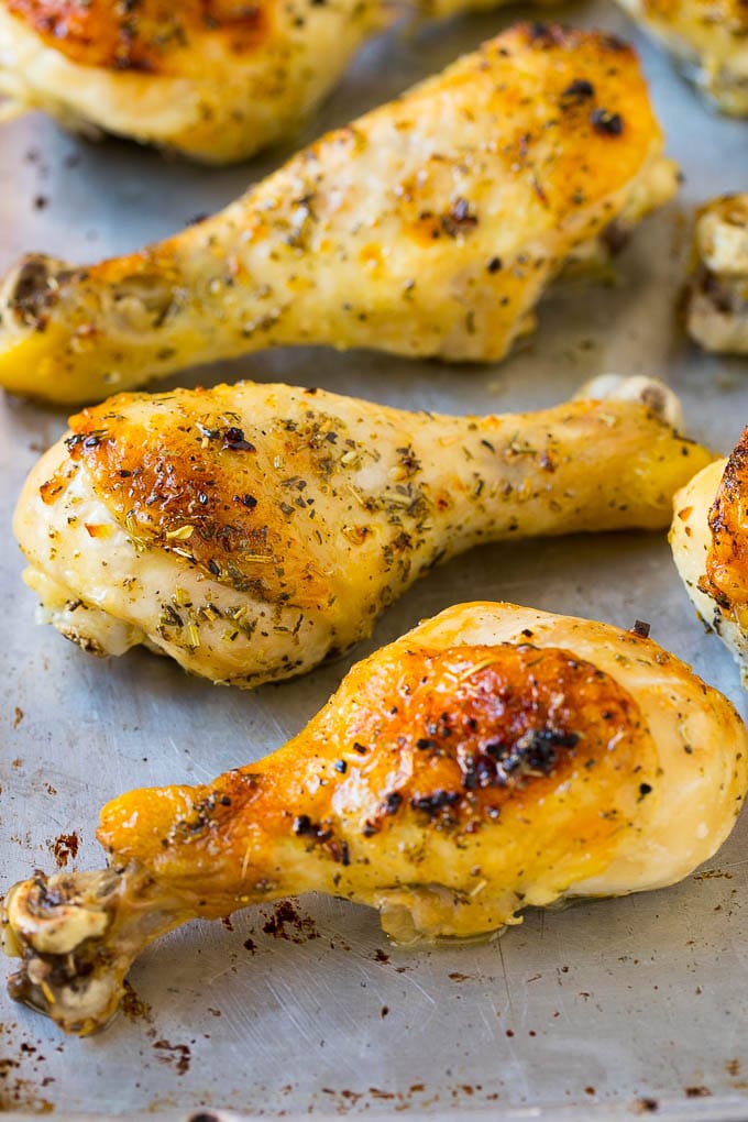 Baked Chicken Drumsticks Recipe | Roasted Chicken Drumsticks | Garlic and Herb Chicken #dinner #chicken #garlic #glutenfree #lowcarb #keto #cleaneating #edsug Baked chicken drumsticks on a sheet pan.
