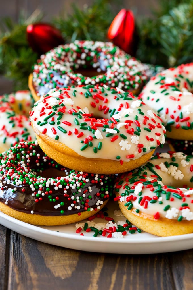 Baked Donuts Recipe | Cake Donuts | Chocolate Donuts | Sprinkle Donuts #donuts #chocolate #sprinkles #breakfast #brunch #edsug Baked donuts topped with chocolate ganache and decorated with holiday sprinkles.
