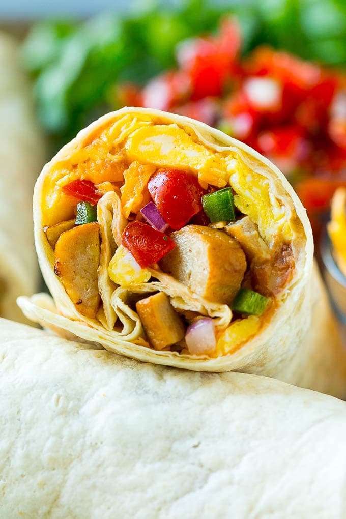 Breakfast Burrito Recipe | Sausage Breakfast Burrito #breakfast #sausage #eggs #burrito #edsug A breakfast burrito stuffed with sausage, eggs, pico de gallo and cheese.