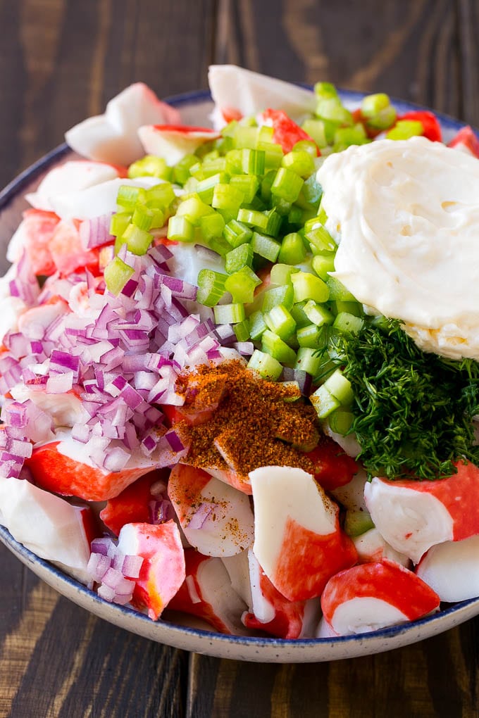 Crab Salad Recipe | Seafood Salad | Deli Salad #crab #salad #seafood #lowcarb #keto #lunch #dinner #edsug Imitation crab, seasoning, dill, celery and mayonnaise in a bowl.