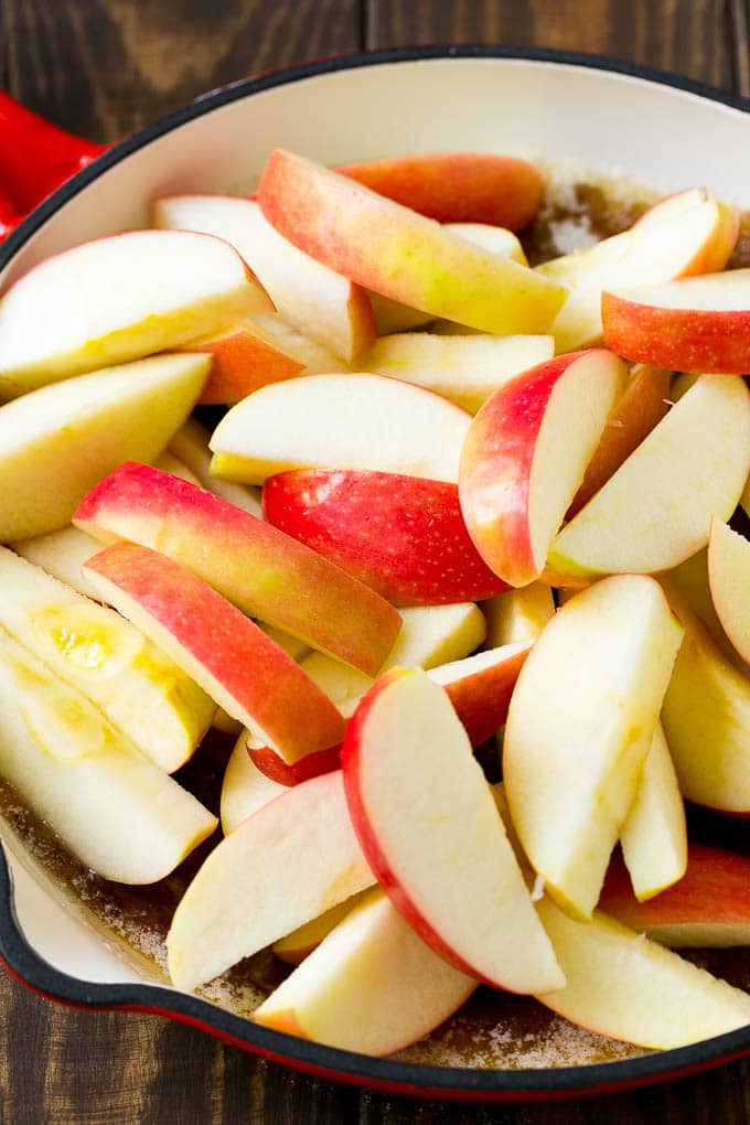 Fried Apples Recipe | Sauteed Apples | Cinnamon Sugar Apples #apples #cinnamon #sugar #sidedish #dessert #edsug #fall Sliced apples in a pan with butter, sugar and cinnamon.