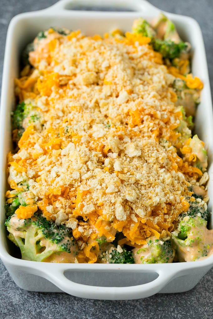 Broccoli Casserole Recipe | Broccoli and Cheese Casserole | Baked Broccoli #broccoli #cheese #casserole #sidedish #dinner #edsug Broccoli in cheese sauce topped with crushed crackers and shredded cheese.