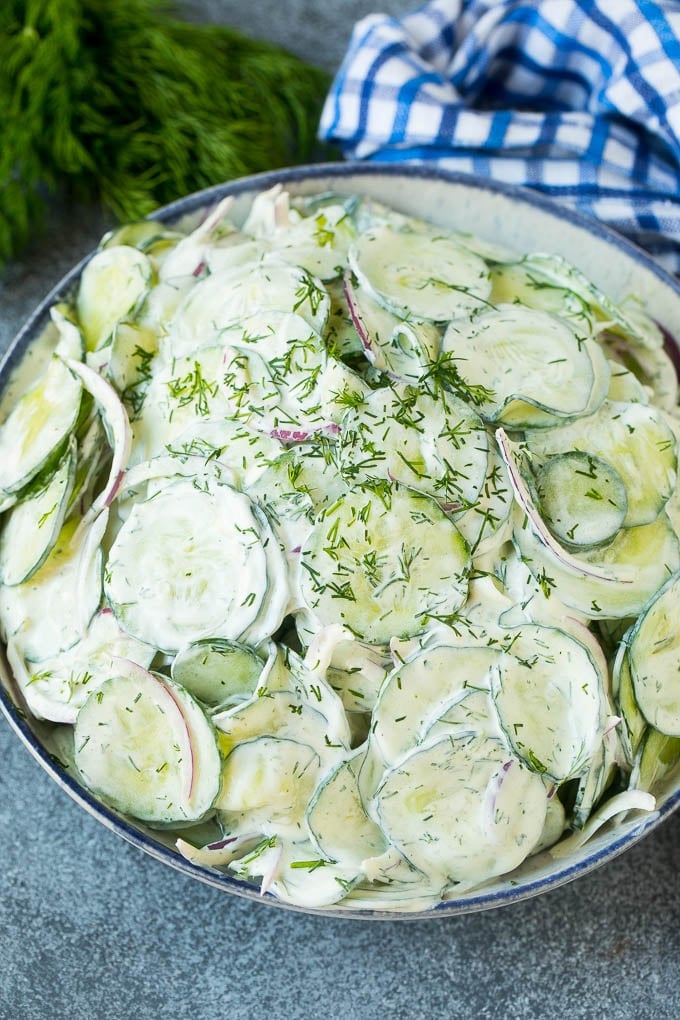 Creamy Cucumber Salad Recipe | German Cucumber Salad | Cucumber Salad #cucumber #salad #dinner #lunch #edsug #cucumbersalad Creamy cucumber salad with red onion and dill, topped with fresh herbs for garnish.
