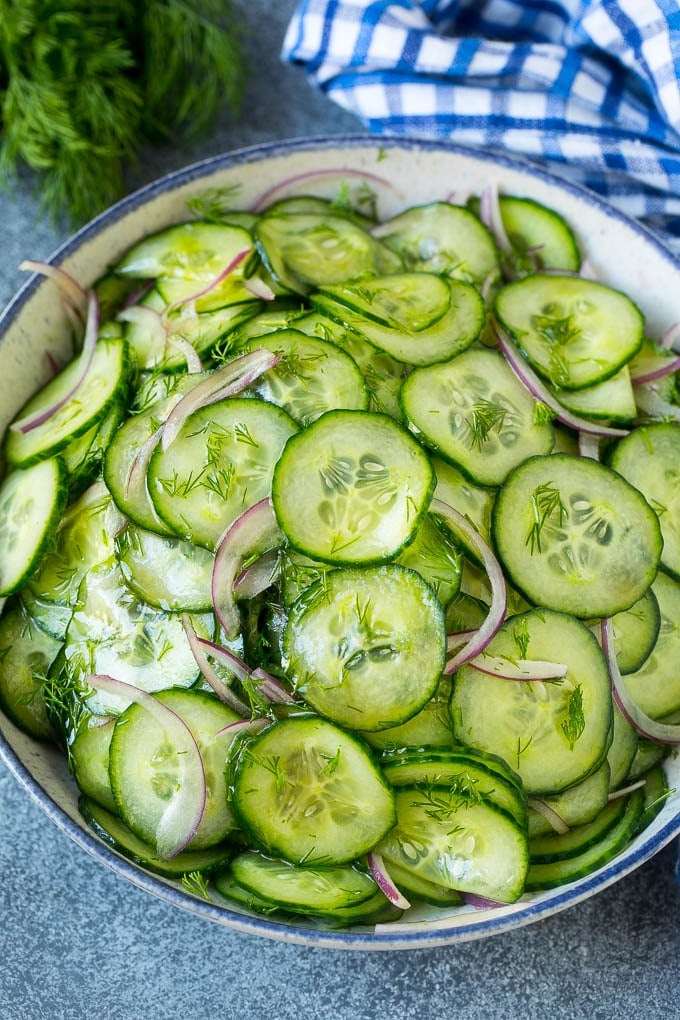 Cucumber Salad Recipe | Cucumber Dill Salad | Cucumber Recipe #cucumbers #salad #glutenfree #sidedish #edsug Cucumber salad in a serving bowl with sliced English cucumbers, red onion and fresh dill.