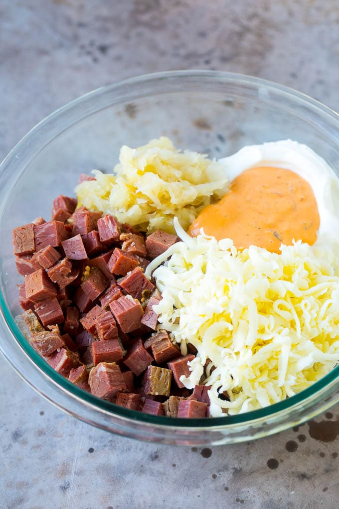 Reuben Dip Recipe | Corned Beef Dip | Cheese Dip #dip #cheese #cornedbeef #appetizer #lowcarb #keto #edsug Corned beef, cream cheese, Thousand Island dressing and cheese in a bowl.