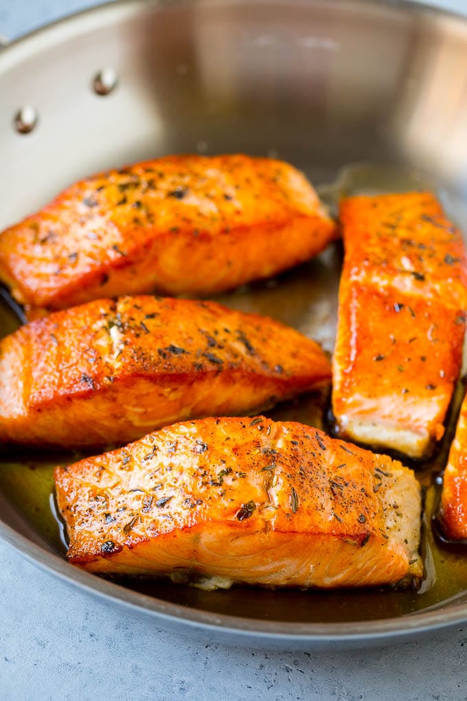 Greek Salmon Salad Recipe | Low Carb Salmon Recipe | Salmon Salad #salmon #seafood #fish #lowcarb #keto #lunch #edsug #healthy Seared fish fillets in a skillet.