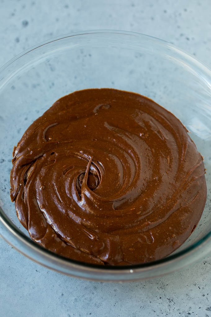 Cosmic Brownies Recipe | Cocoa Brownies | Frosted Brownies #brownies #chocolate #dessert #edsug #sprinkles A bowl of cocoa brownie batter.
