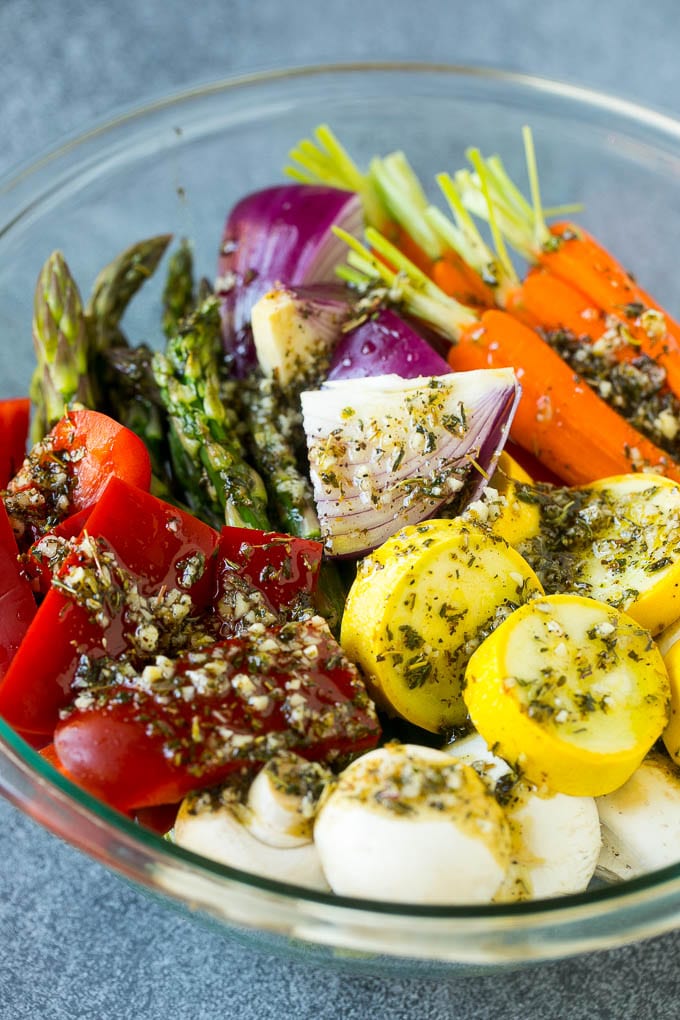 Grilled Vegetables Recipe | Marinated Vegetables | Grilled Veggies #vegetables #veggies #grilling #glutenfree #lowcarb #keto #dinner #edsug #cleaneating #healthy Raw veggies in a bowl with garlic, herbs and olive oil.