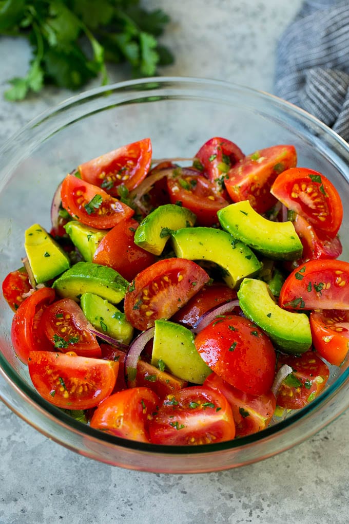 Tomato Avocado Salad Recipe | Avocado Salad | Tomato Salad #salad #tomato #avocado #glutenfree #cleaneating #dinner #edsug #healthy Tomato avocado salad with red onion and a cilantro lime dressing.