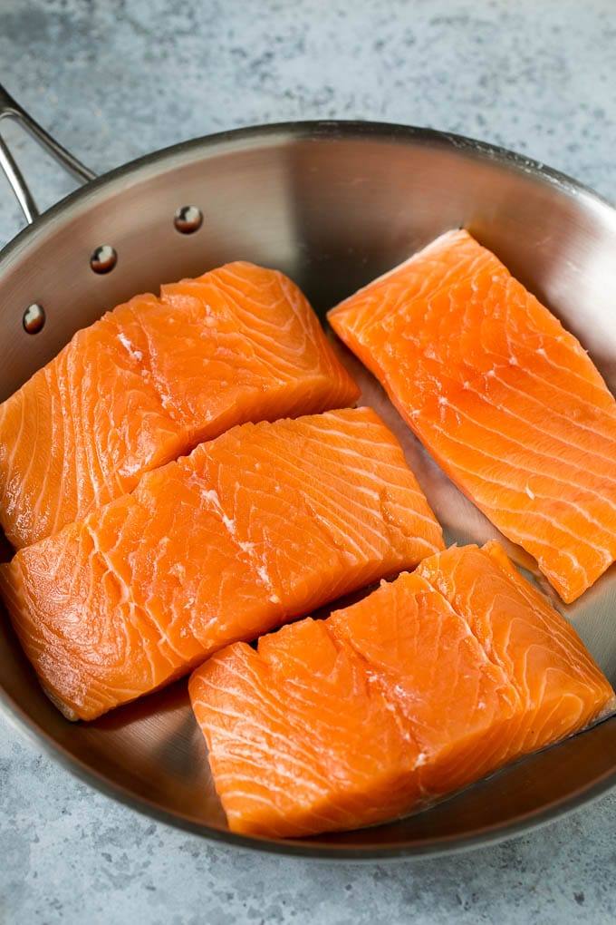 Pan Seared Salmon Recipe | Garlic Butter Salmon | Seared Salmon #salmon #garlic #butter #keto #lowcarb #dinner #edsug Raw salmon fillets in a pan.