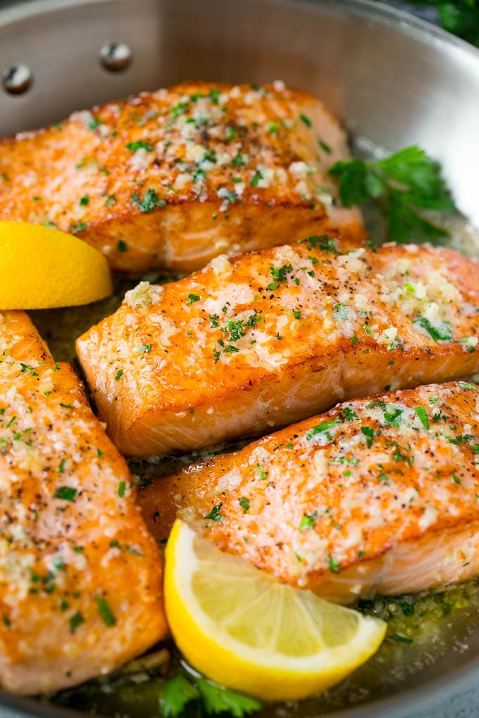 Pan Seared Salmon Recipe | Garlic Butter Salmon | Seared Salmon #salmon #garlic #butter #keto #lowcarb #dinner #edsug A pan of seared salmon in a butter sauce.